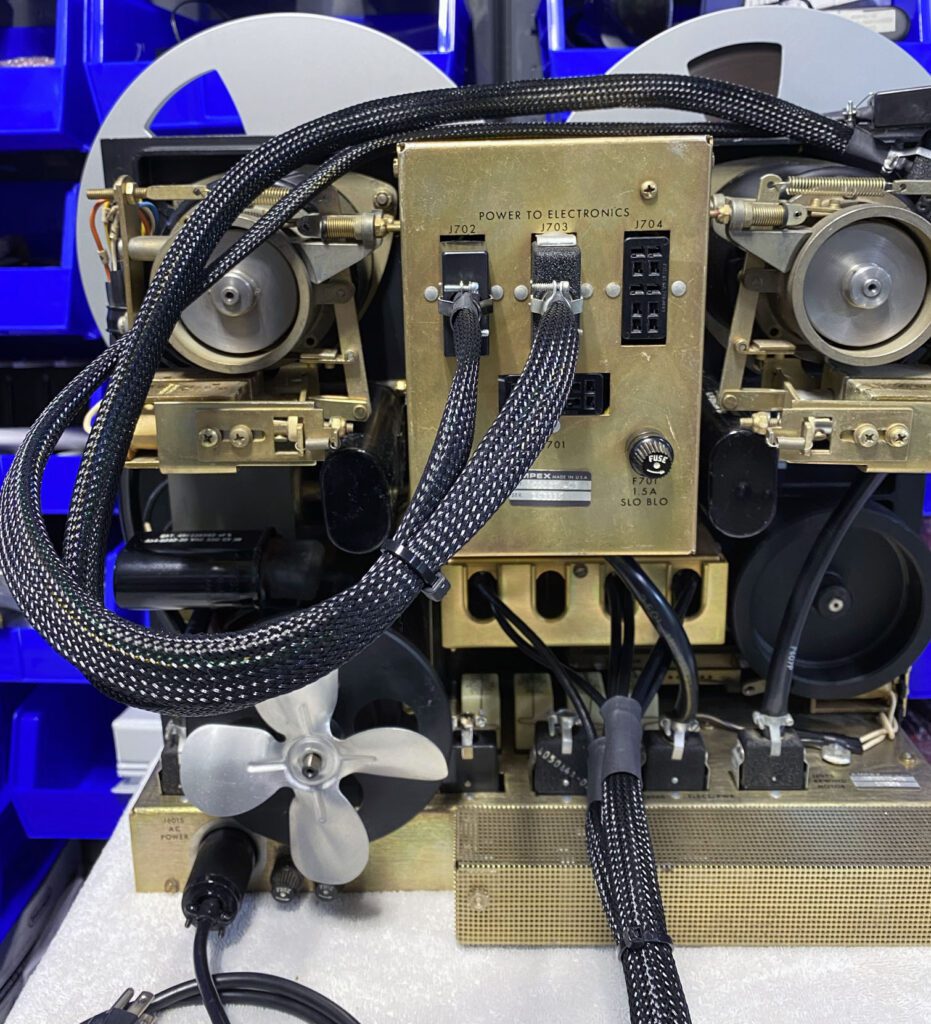 A close up of the front of an old fashioned machine