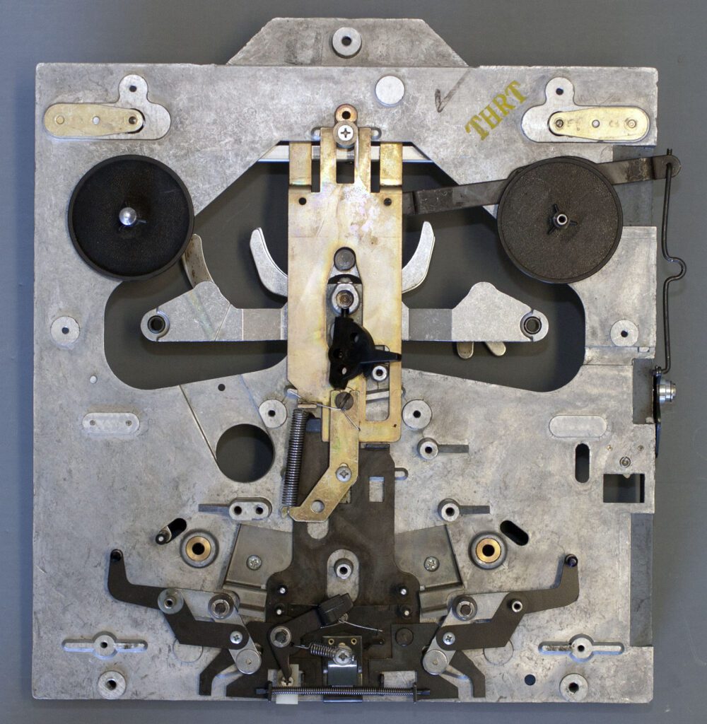 A clock with some parts missing and the mechanism is broken.