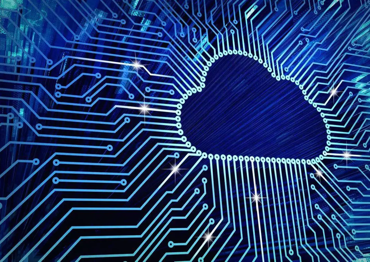 A computer circuit board with the cloud in the center.