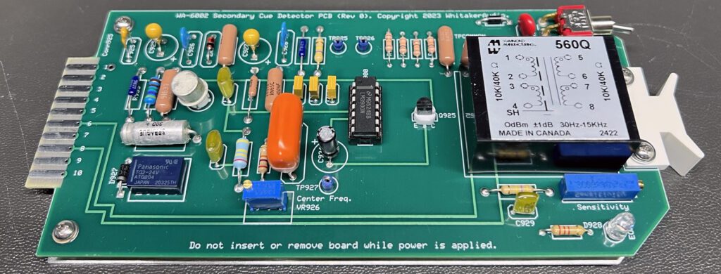 A circuit board with many different electronic components.