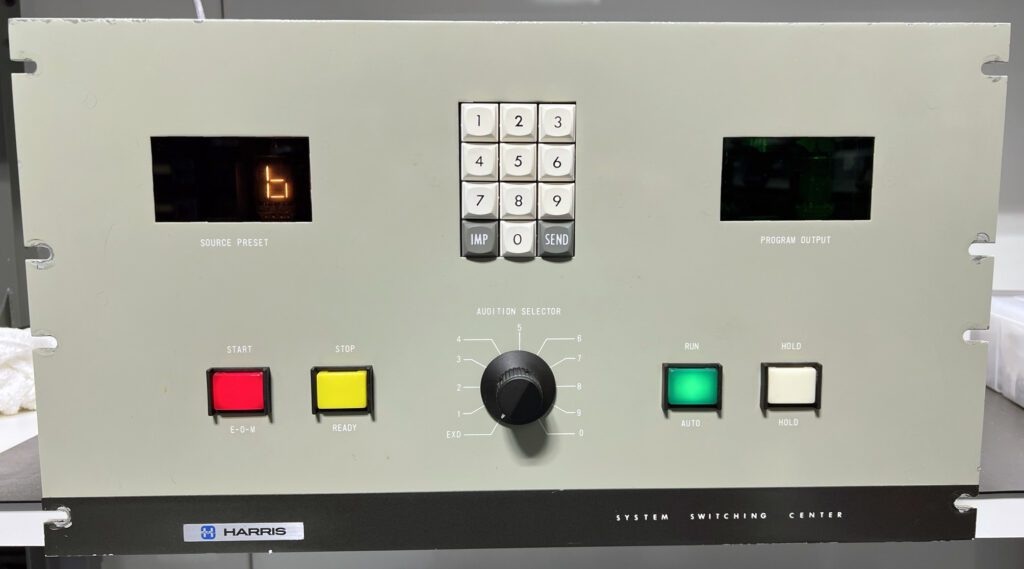 A control panel with buttons and knobs for different types of controls.