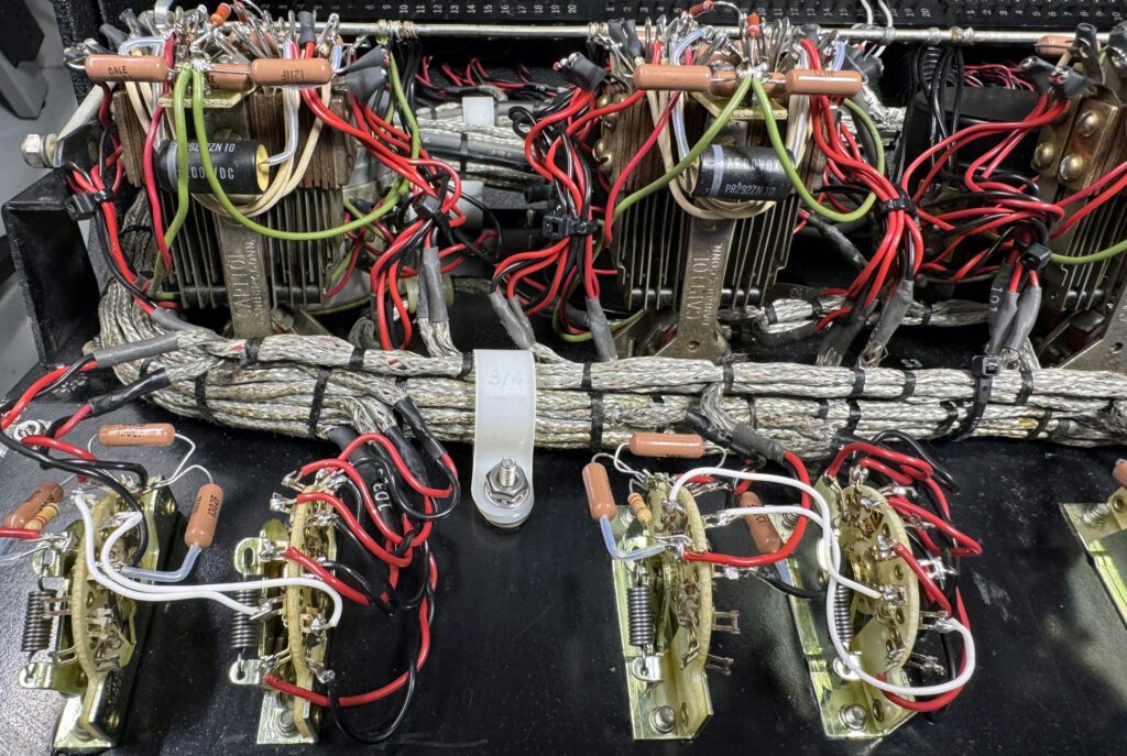 A bunch of wires that are connected to some electrical equipment.